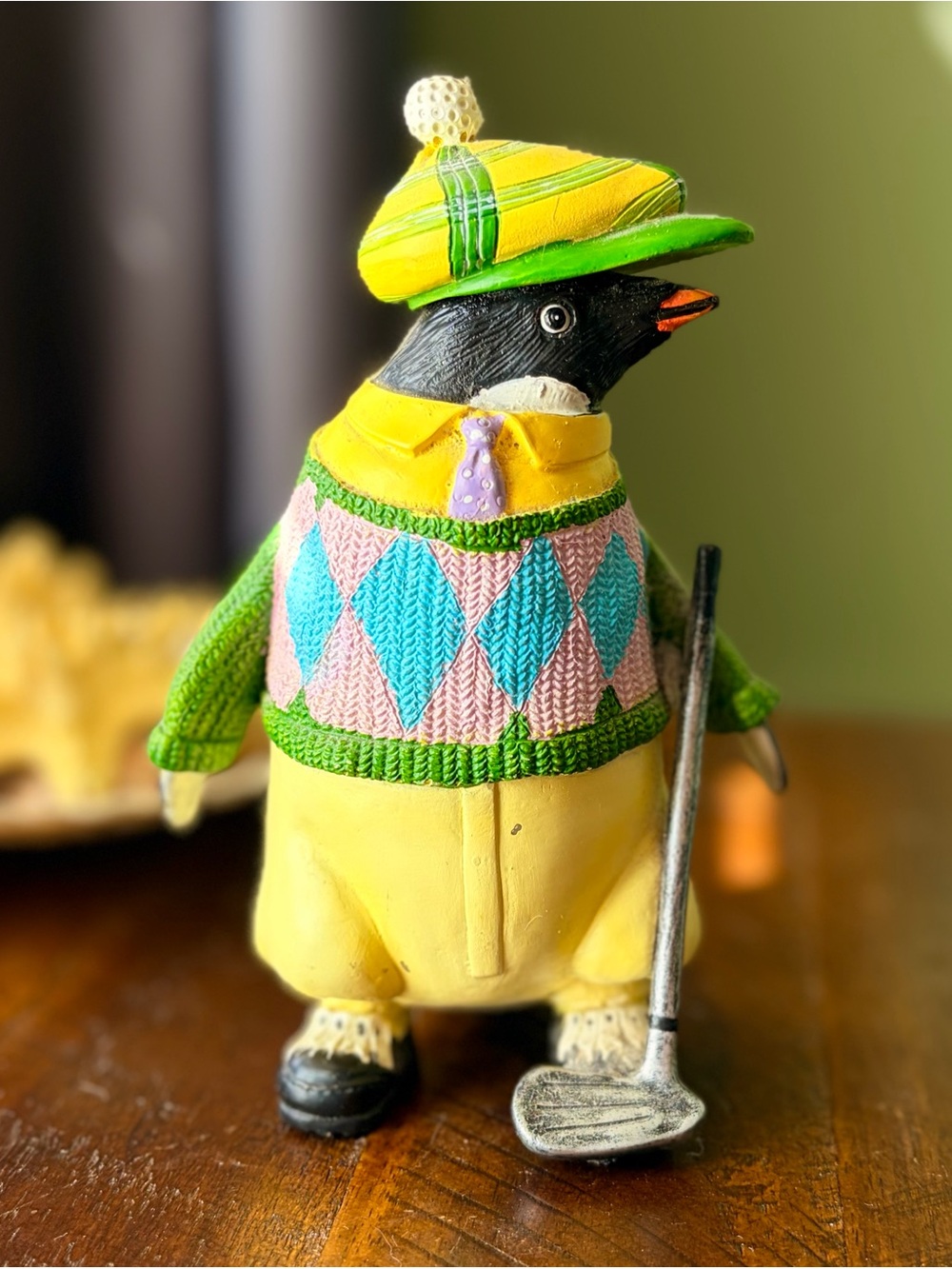 Charming Yellow & Green Golfing Penguin with Sweater & Golfing Gear Figurine